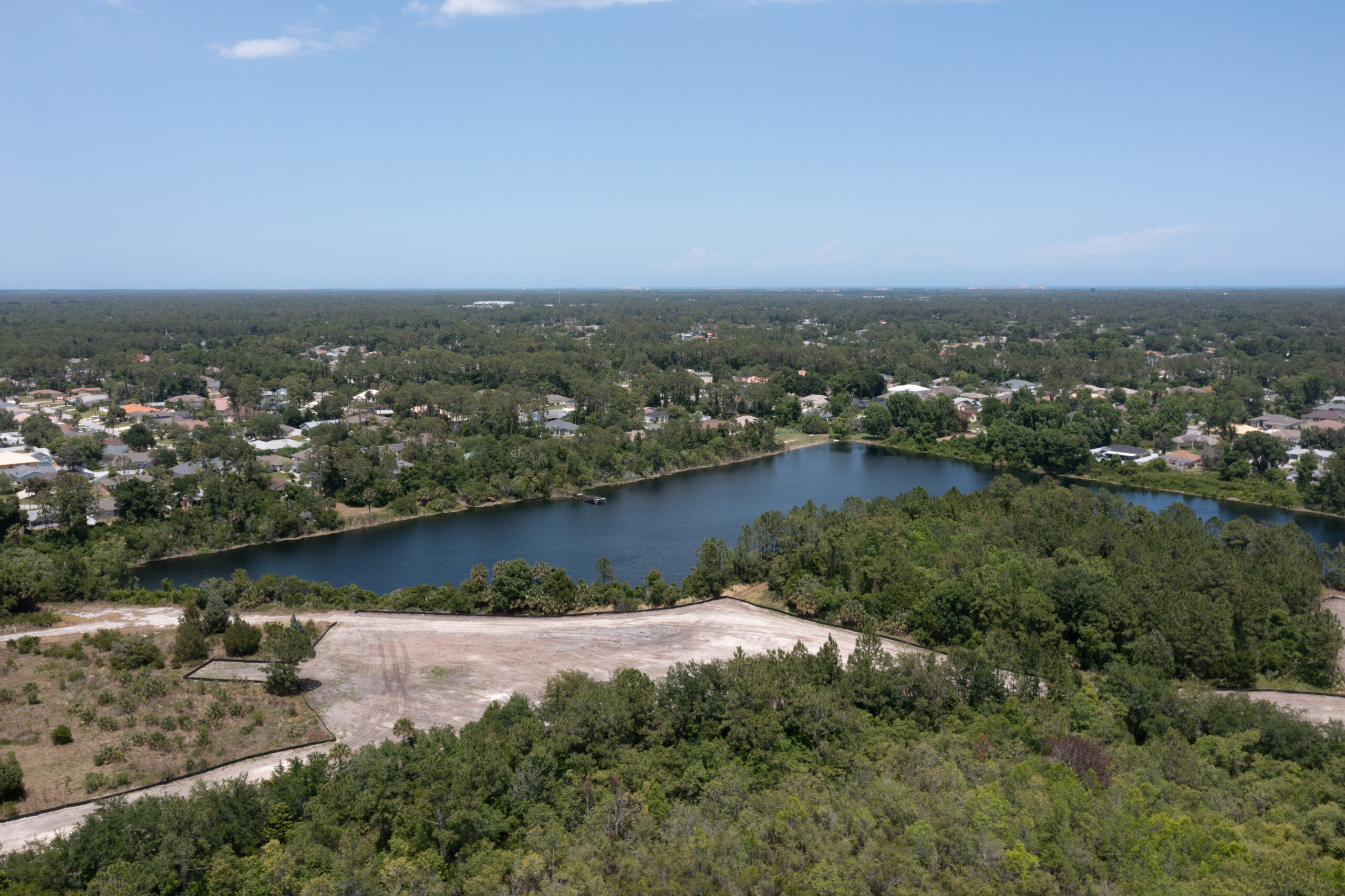 evolve palm coast site drone over pond
